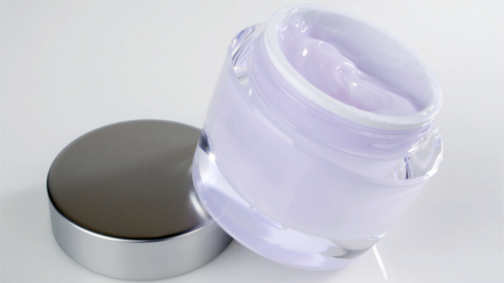 A jar of purple moisturizer